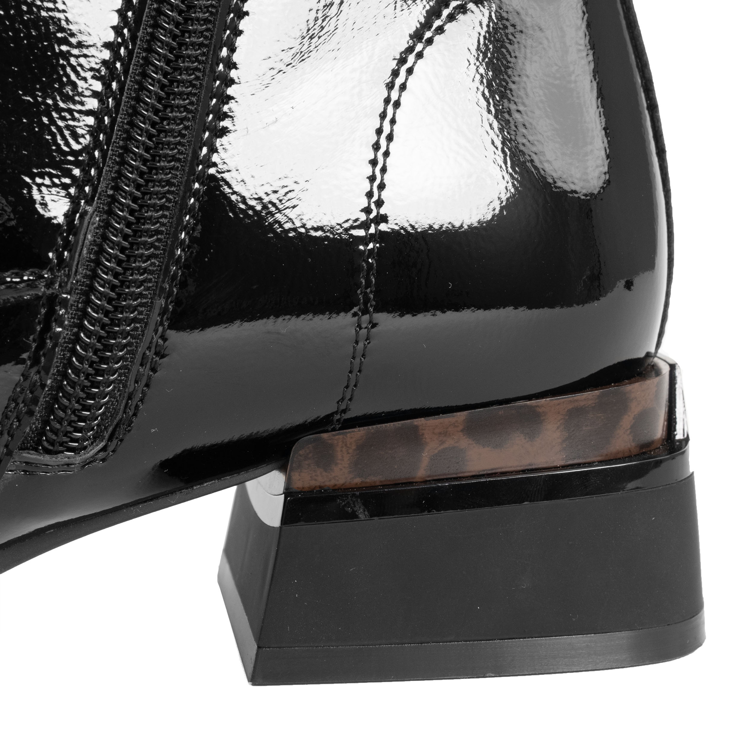 women heeled boots with patent leather and leopard heel