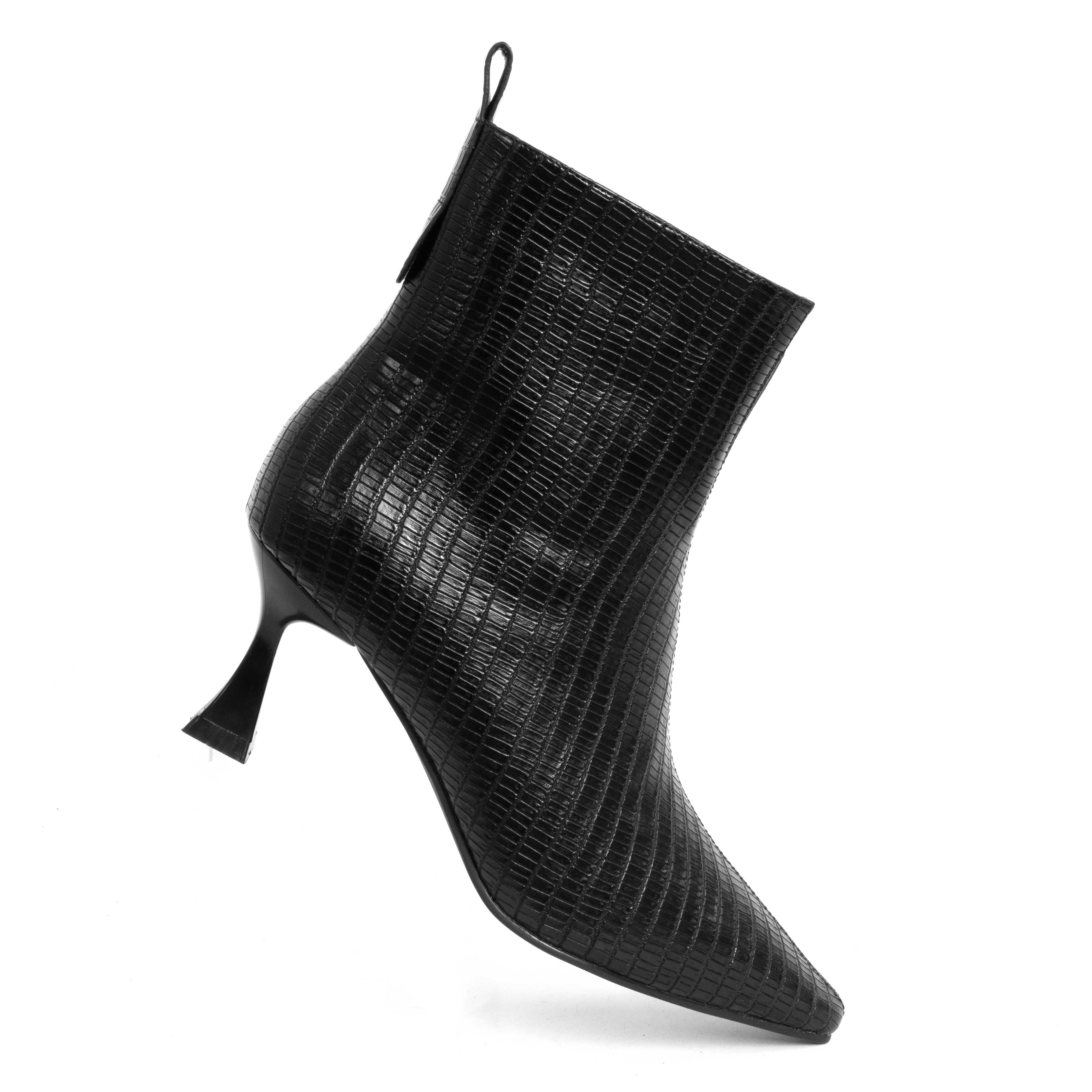 Step into elegance with black Microfiber leather Women heeled boots. Perfect for any occasion, these stylish shoes combine comfort effortlessly