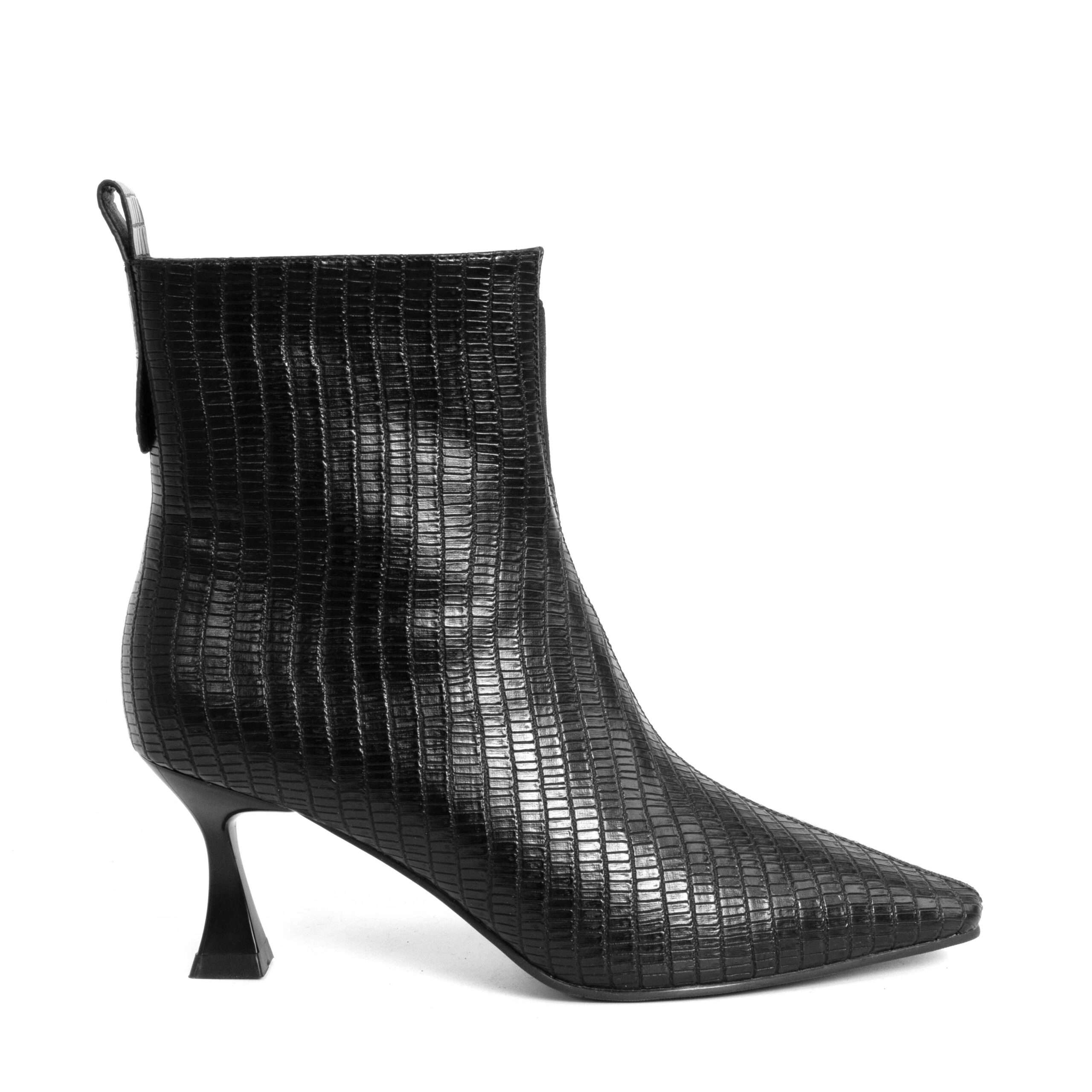 Step into elegance with black Microfiber leather Women heeled boots. Perfect for any occasion, these stylish shoes combine comfort effortlessly
