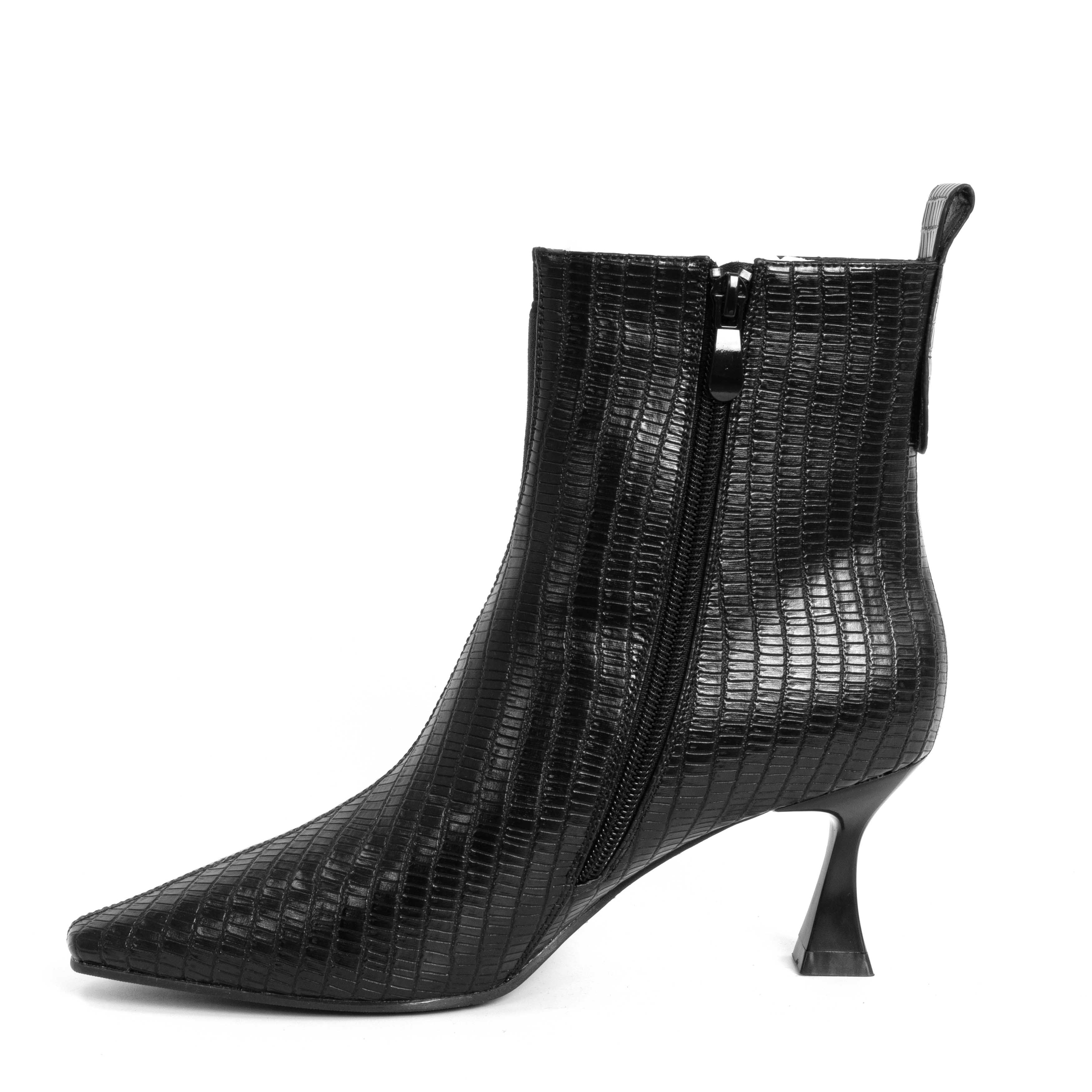 Step into elegance with black Microfiber leather Women heeled boots. Perfect for any occasion, these stylish shoes combine comfort effortlessly