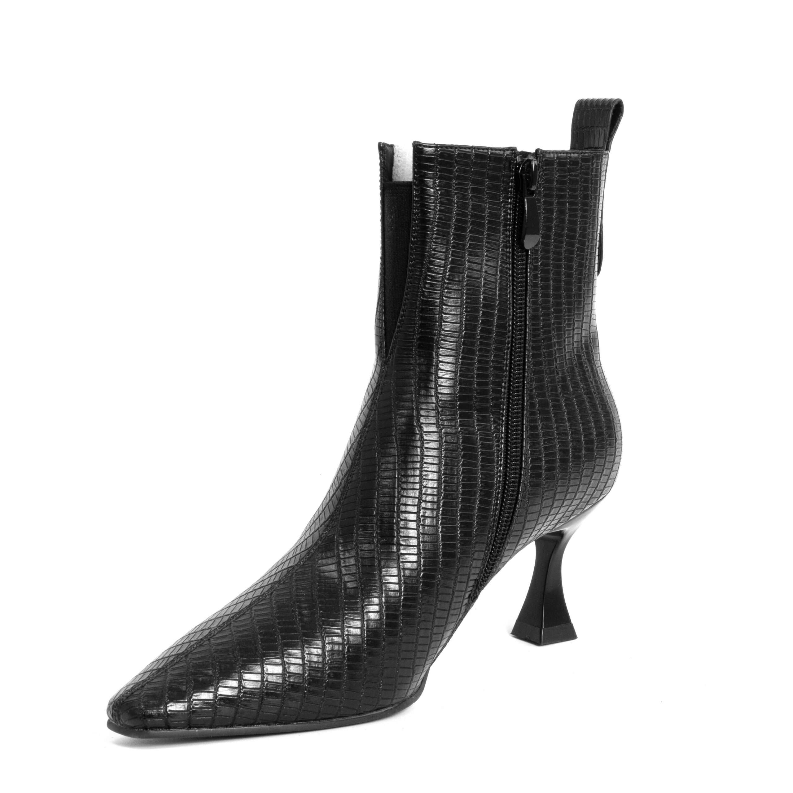 Step into elegance with black Microfiber leather Women heeled boots. Perfect for any occasion, these stylish shoes combine comfort effortlessly