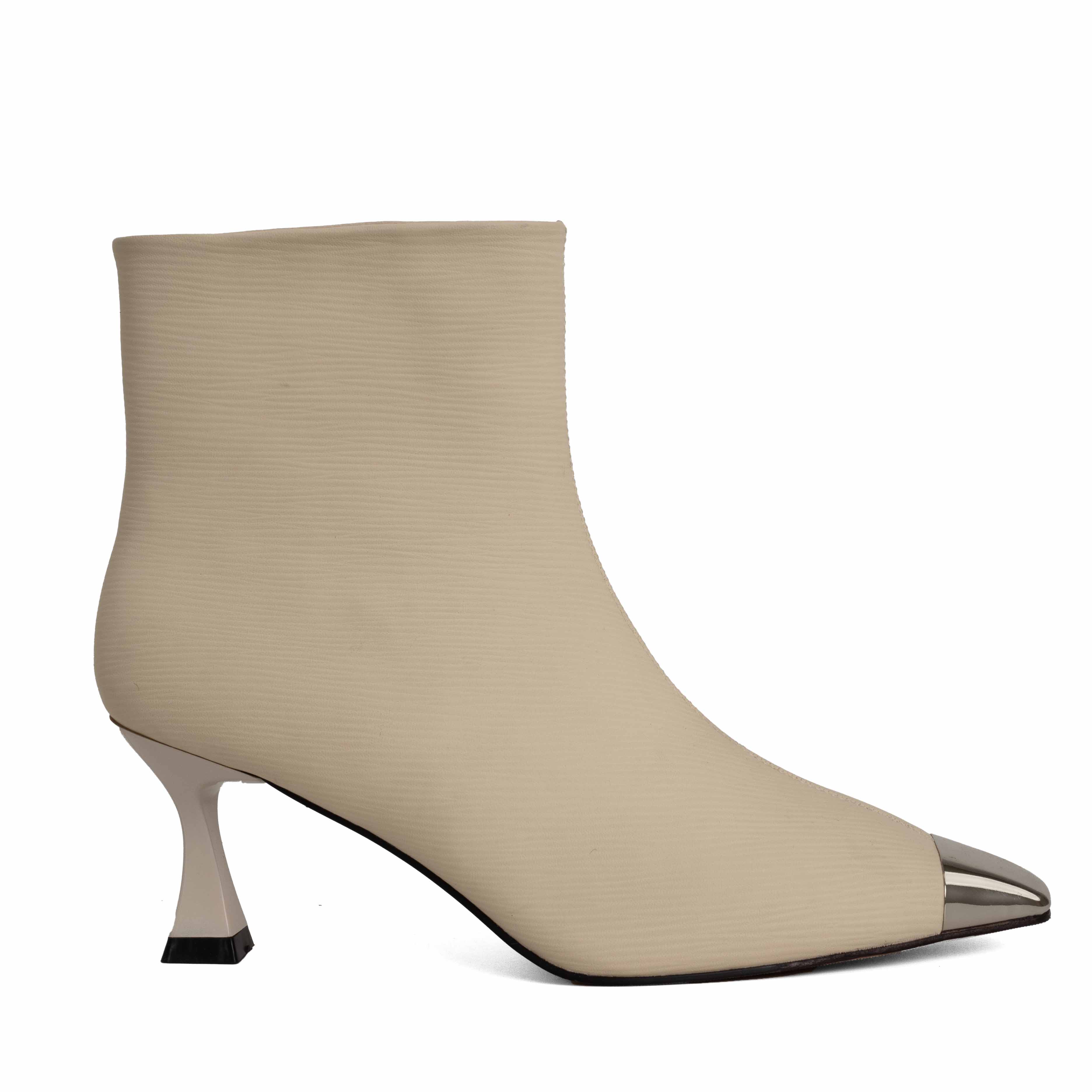 Step into elegance with beige Microfiber leather Women heeled boots. Perfect for any occasion, these stylish shoes combine comfort effortlessly
