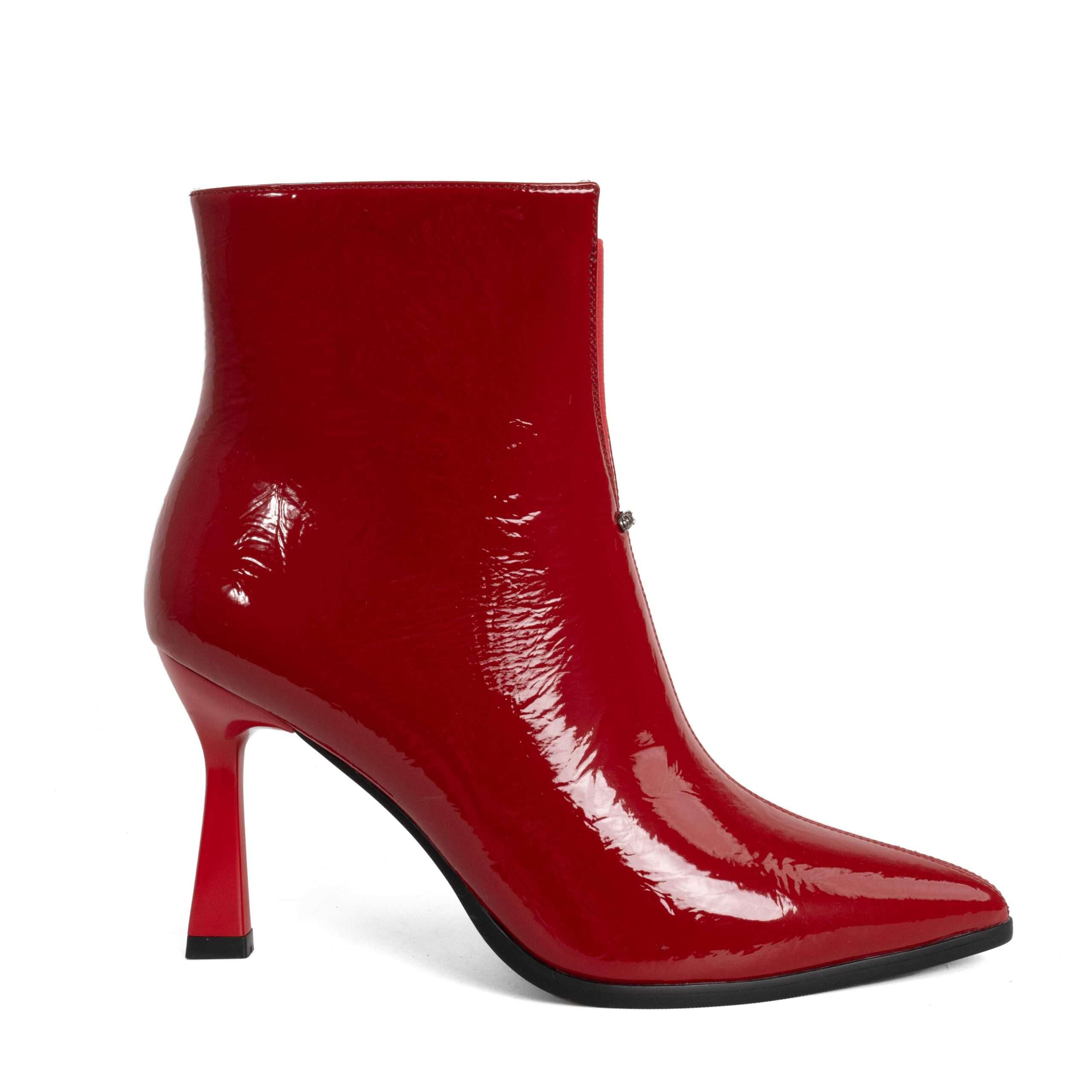 Step into elegance with Red Patent leather Women heeled boots. Perfect for any occasion, these stylish shoes combine comfort effortlessly