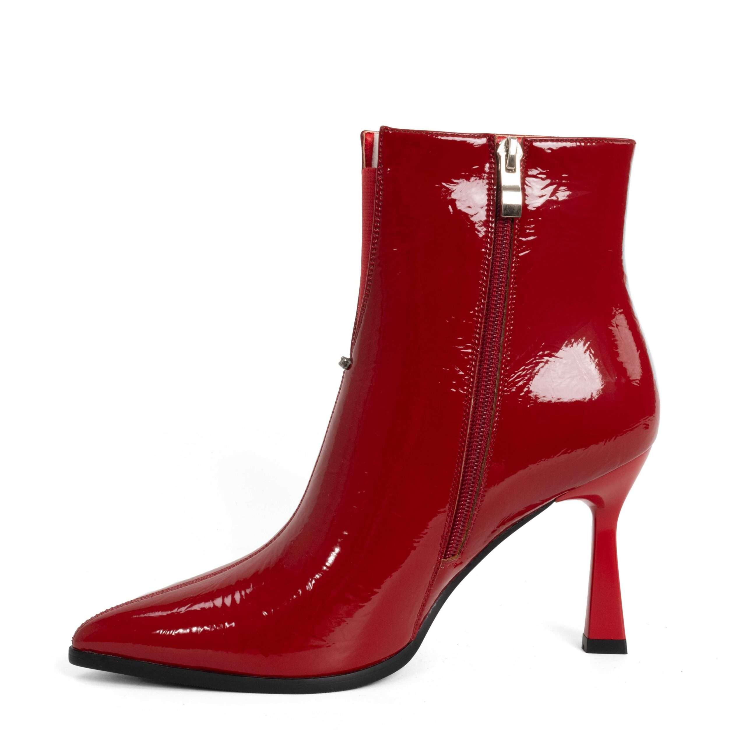 Step into elegance with Red Patent leather Women heeled boots. Perfect for any occasion, these stylish shoes combine comfort effortlessly