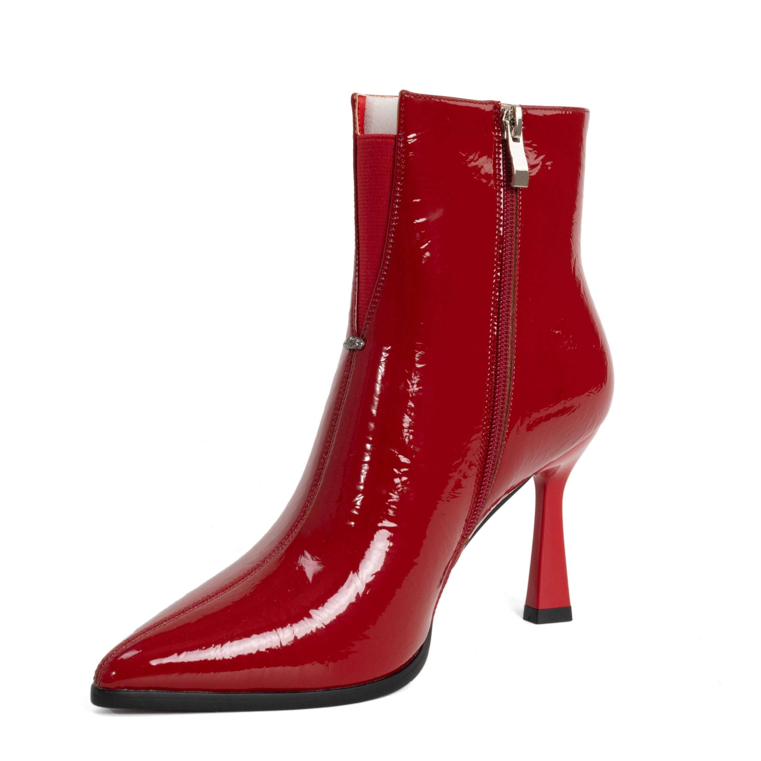 Step into elegance with Red Patent leather Women heeled boots. Perfect for any occasion, these stylish shoes combine comfort effortlessly