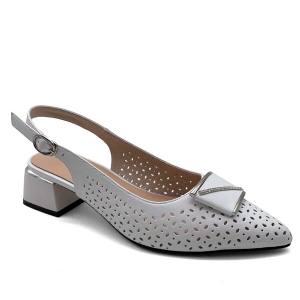 White laser-cut perforated slingback with crystal buckle ornament